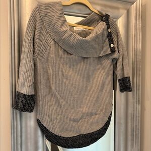 This stylish 89th & Madison Sweater will fit perfectly into your fall wardrobe!